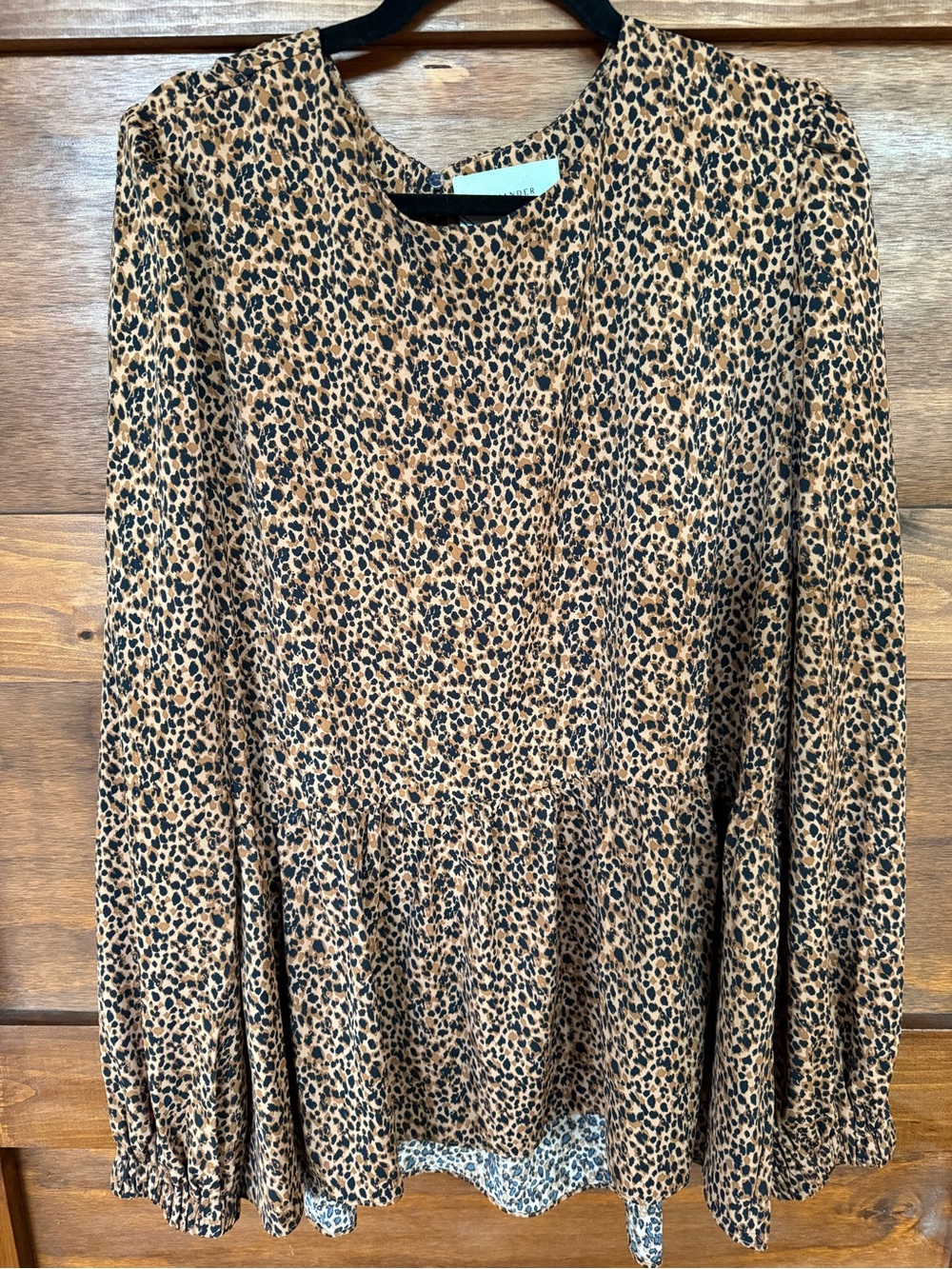 Pomander Place Black and Tan Leopard Peplum Long Sleeve Top